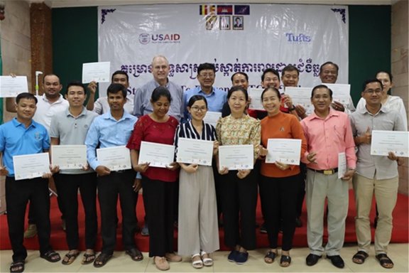 Group photo of the Cambodia OH-DReaM Working Group, participants are holding their certificates.